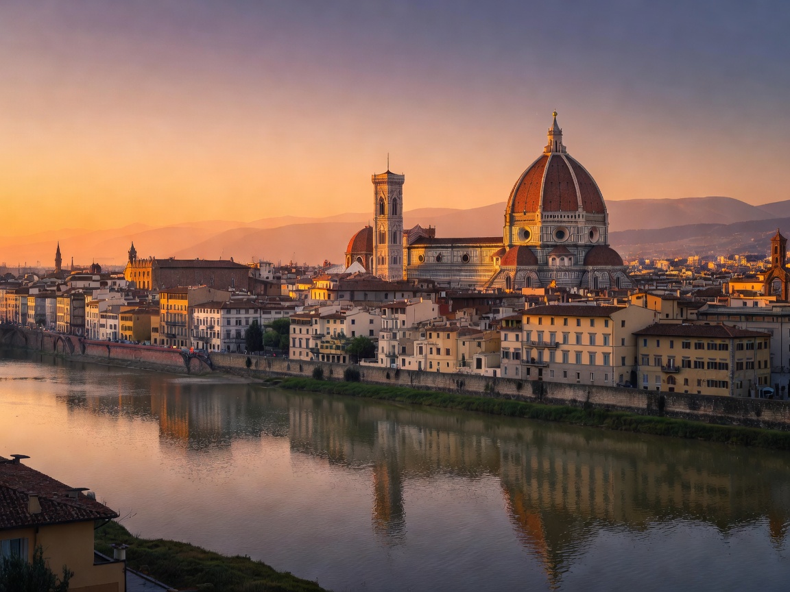 Panoramic view of the Duomo cathedral in Florence with the Arno river at sunset